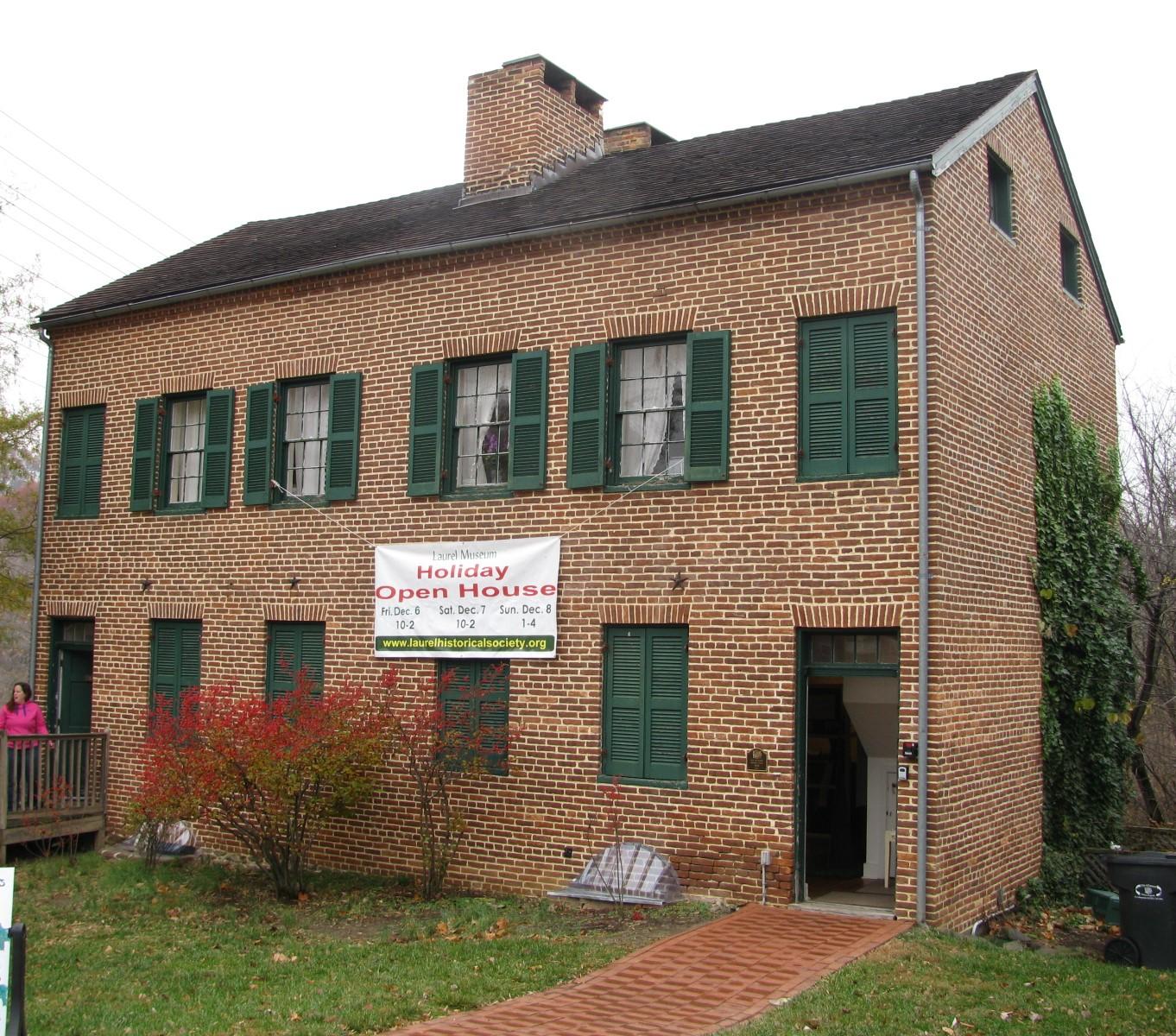Image of the exterior of an older brick house